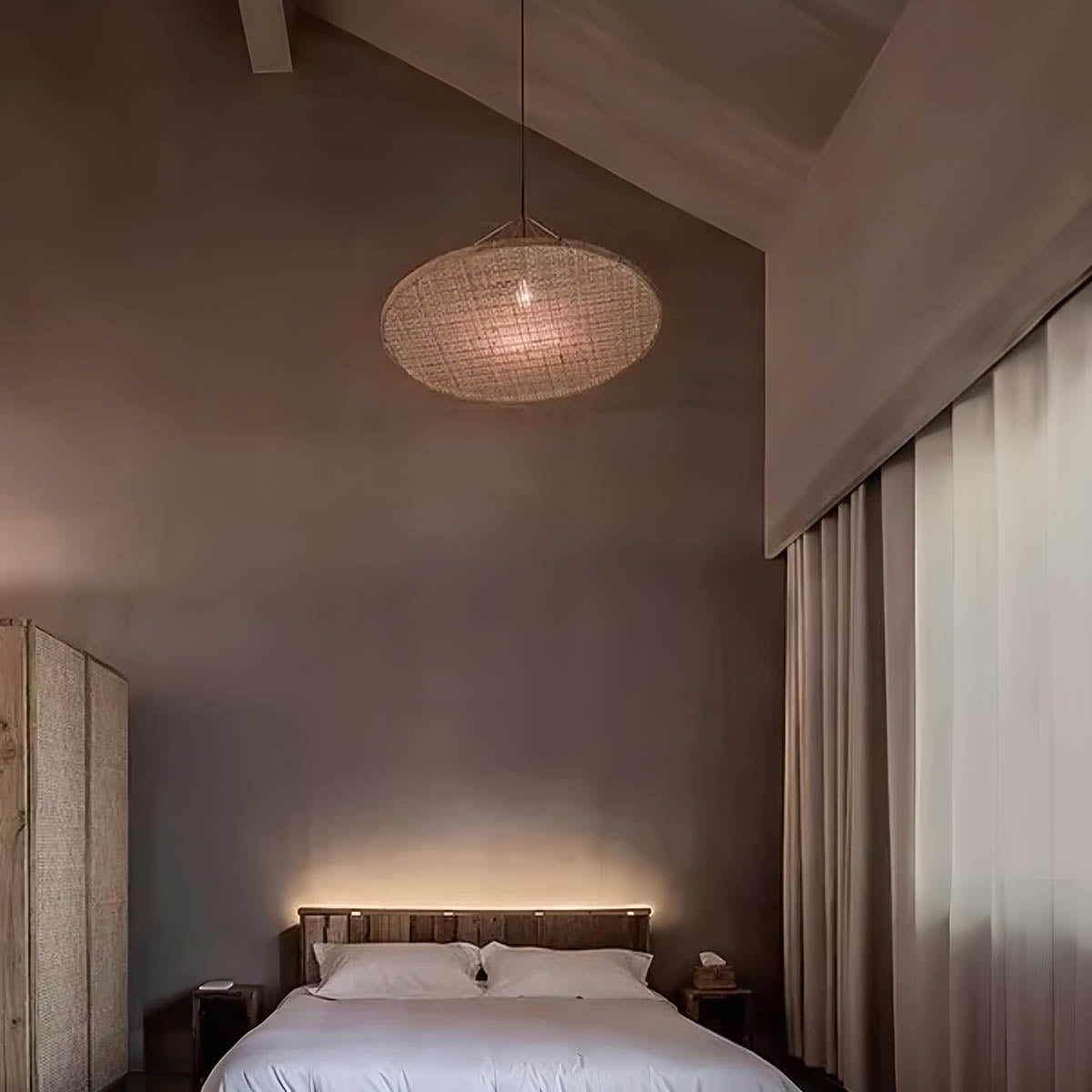 Hand-woven bamboo pendant light, wide circular shade